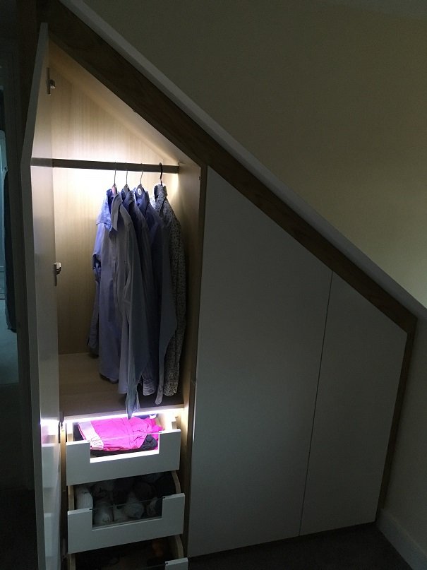 Whir=te laquered fitted wardrobe completed