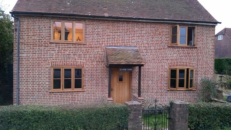 period building fitted with wooden casement windows